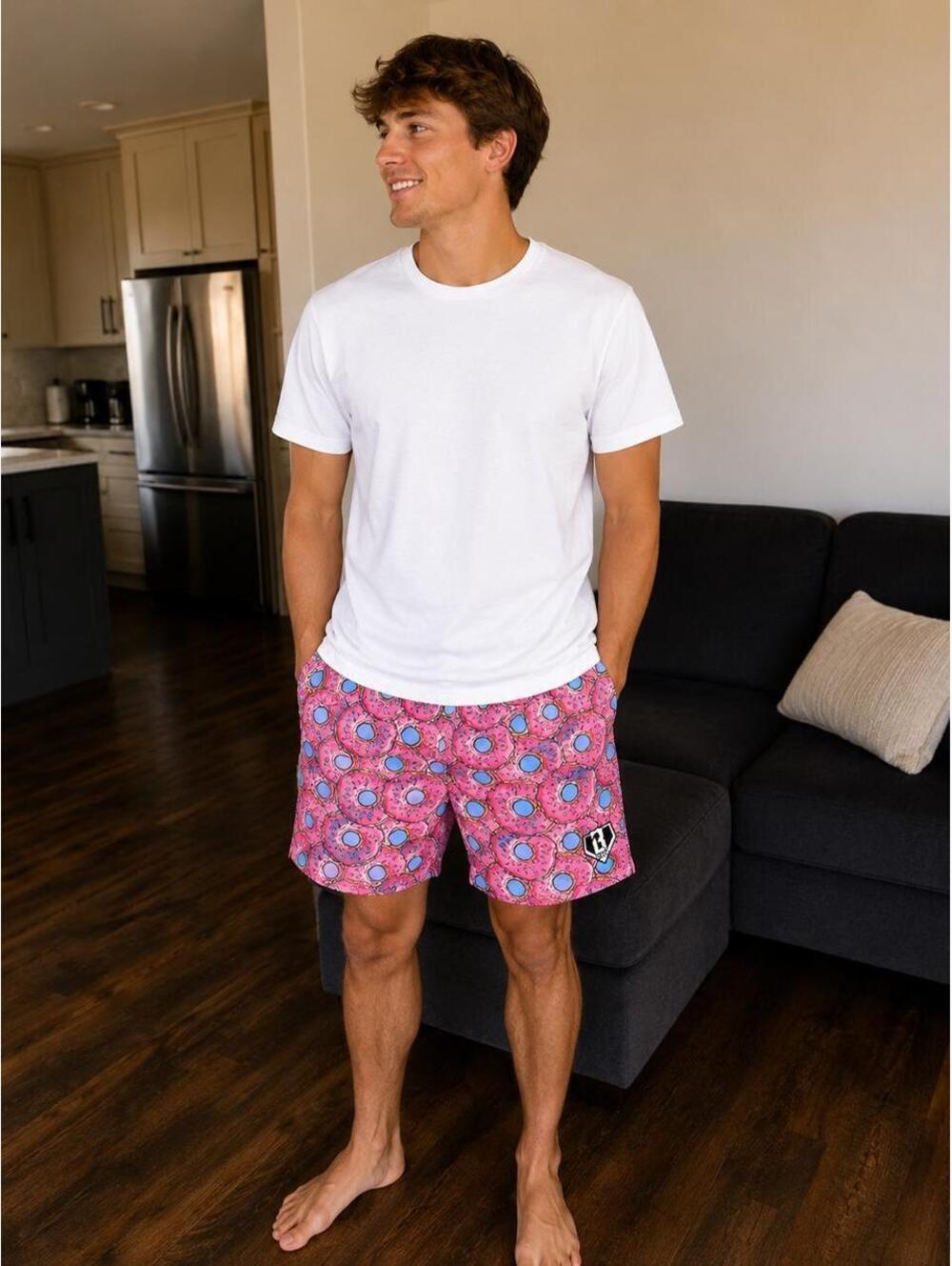 Baseball lifestyle Donut Swim Shorts with pink background